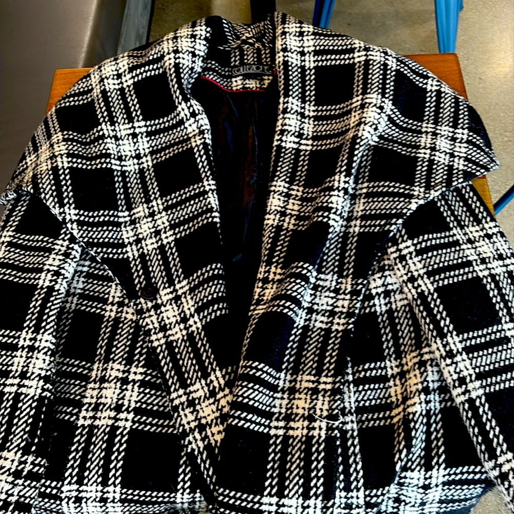 A black and white waist trench coat